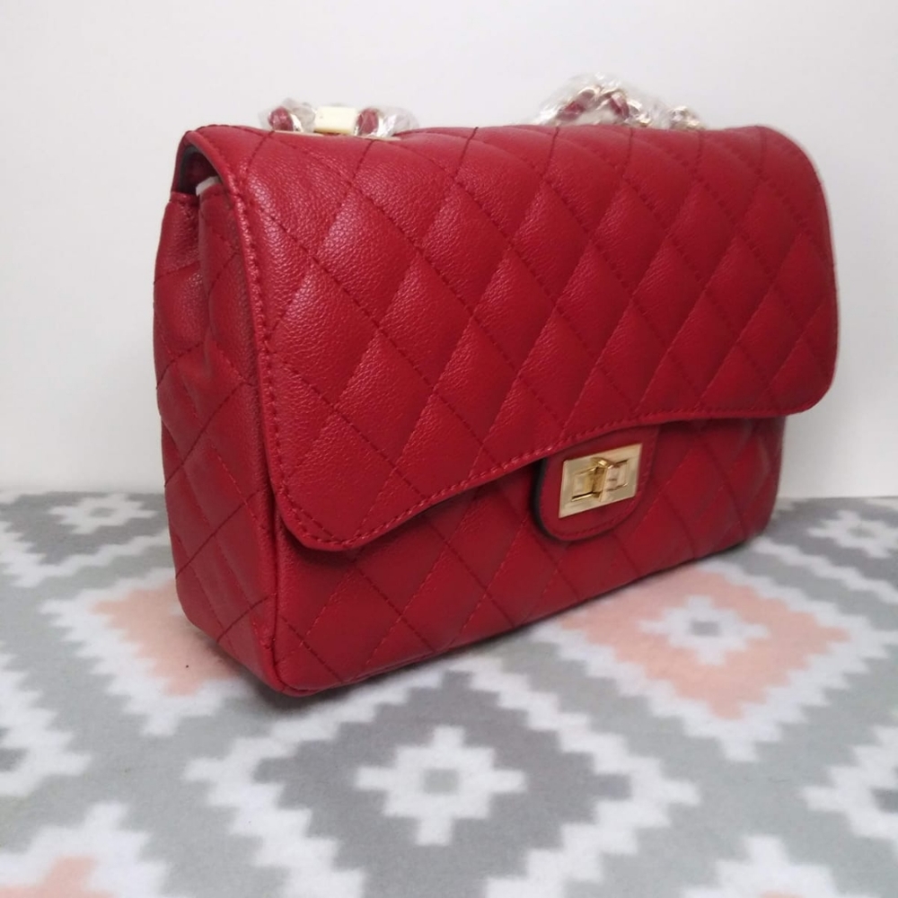 Red quilted handbag